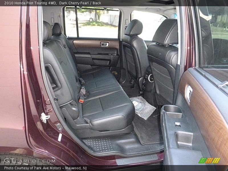 Dark Cherry Pearl / Black 2010 Honda Pilot Touring 4WD