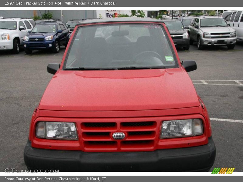 Wildfire Red / Dark Charcoal 1997 Geo Tracker Soft Top 4x4