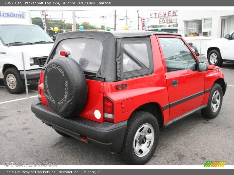 Wildfire Red / Dark Charcoal 1997 Geo Tracker Soft Top 4x4