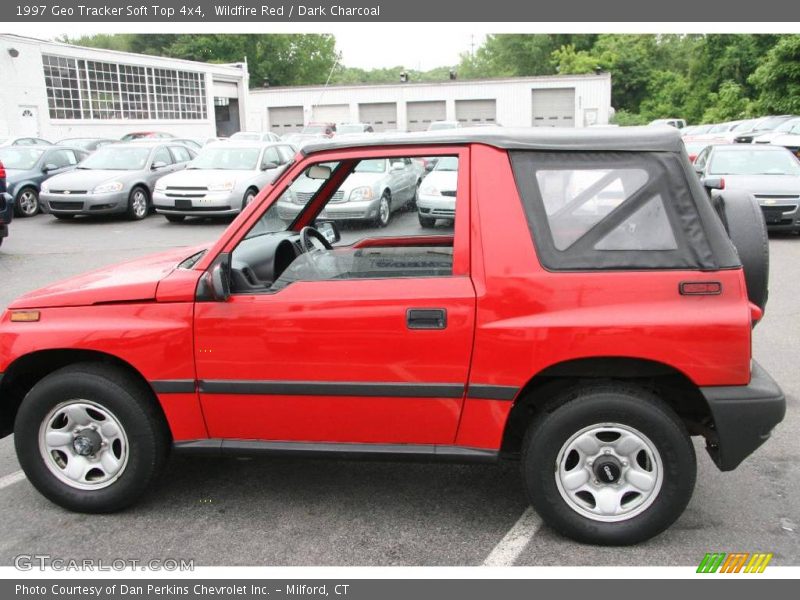 Wildfire Red / Dark Charcoal 1997 Geo Tracker Soft Top 4x4