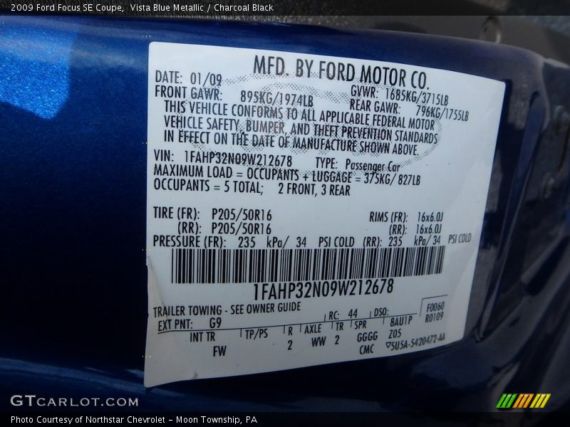 Vista Blue Metallic / Charcoal Black 2009 Ford Focus SE Coupe