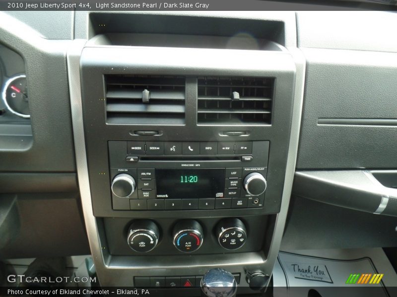 Light Sandstone Pearl / Dark Slate Gray 2010 Jeep Liberty Sport 4x4