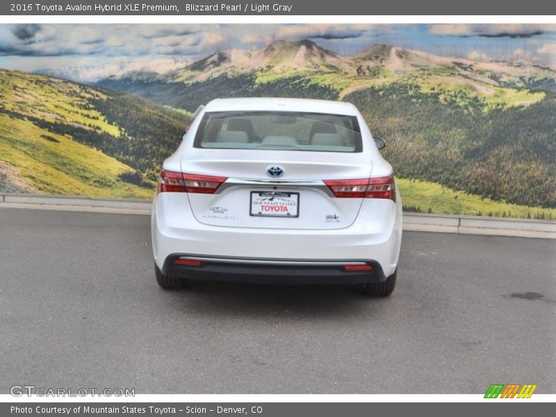 Blizzard Pearl / Light Gray 2016 Toyota Avalon Hybrid XLE Premium