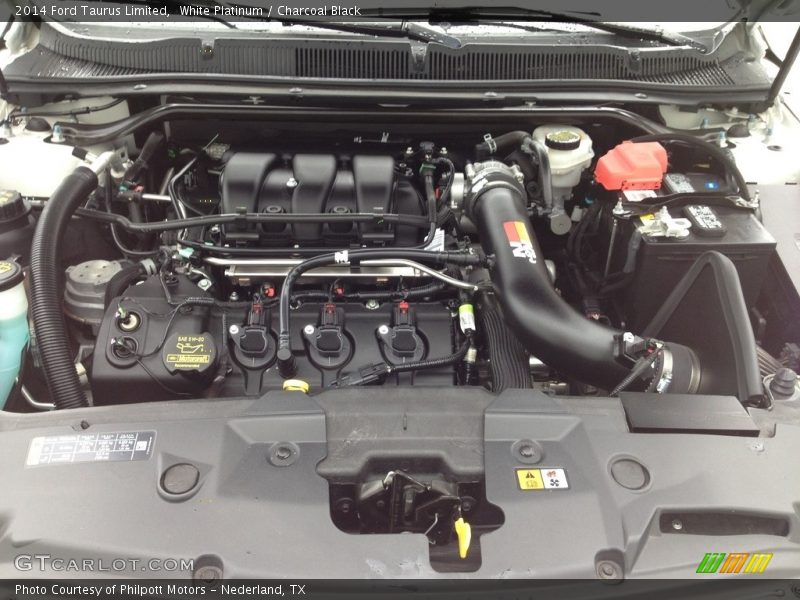 White Platinum / Charcoal Black 2014 Ford Taurus Limited