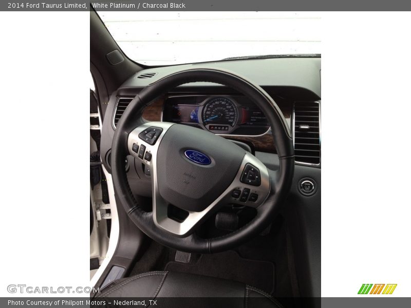 White Platinum / Charcoal Black 2014 Ford Taurus Limited