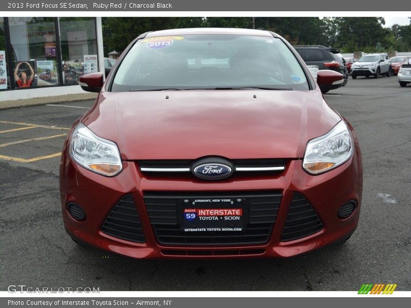 Ruby Red / Charcoal Black 2013 Ford Focus SE Sedan