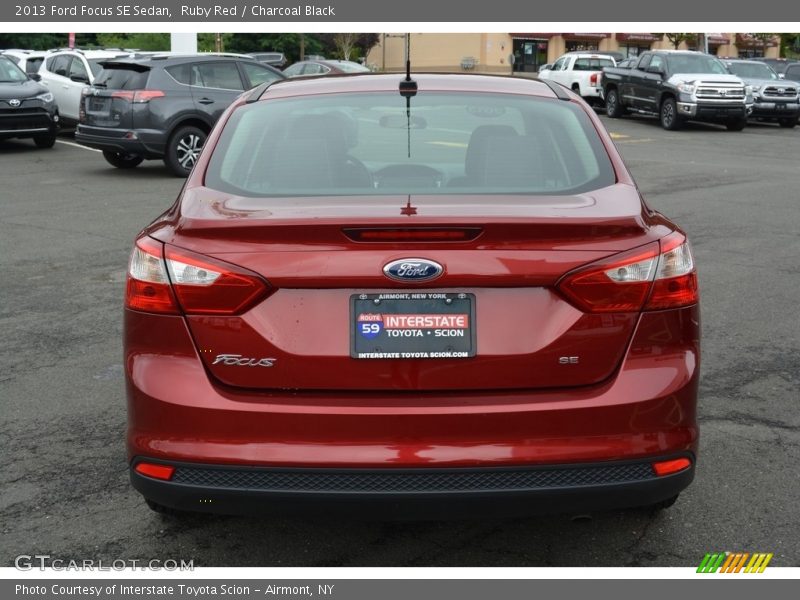 Ruby Red / Charcoal Black 2013 Ford Focus SE Sedan