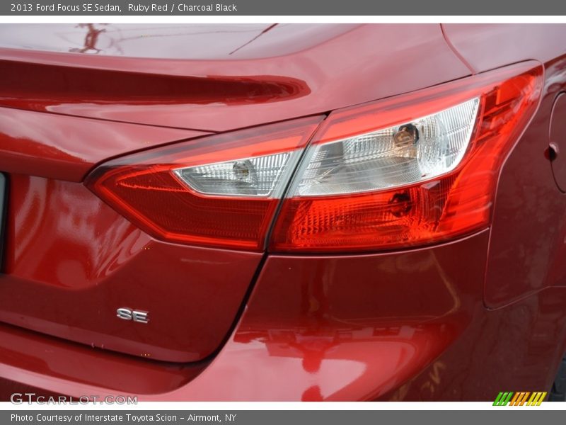 Ruby Red / Charcoal Black 2013 Ford Focus SE Sedan