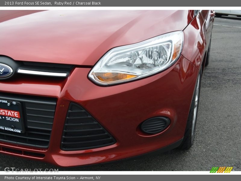 Ruby Red / Charcoal Black 2013 Ford Focus SE Sedan