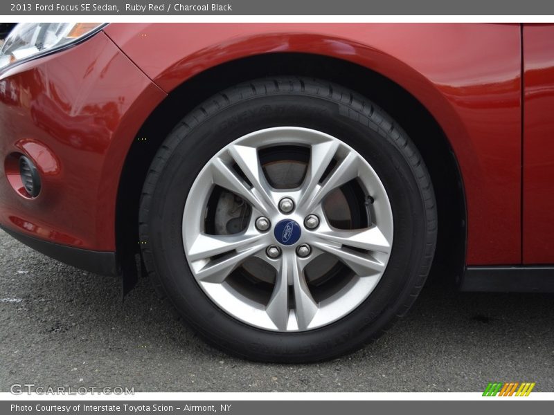 Ruby Red / Charcoal Black 2013 Ford Focus SE Sedan