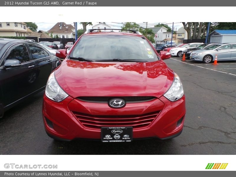 Garnet Red / Taupe 2012 Hyundai Tucson GLS AWD