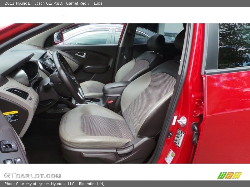 Garnet Red / Taupe 2012 Hyundai Tucson GLS AWD