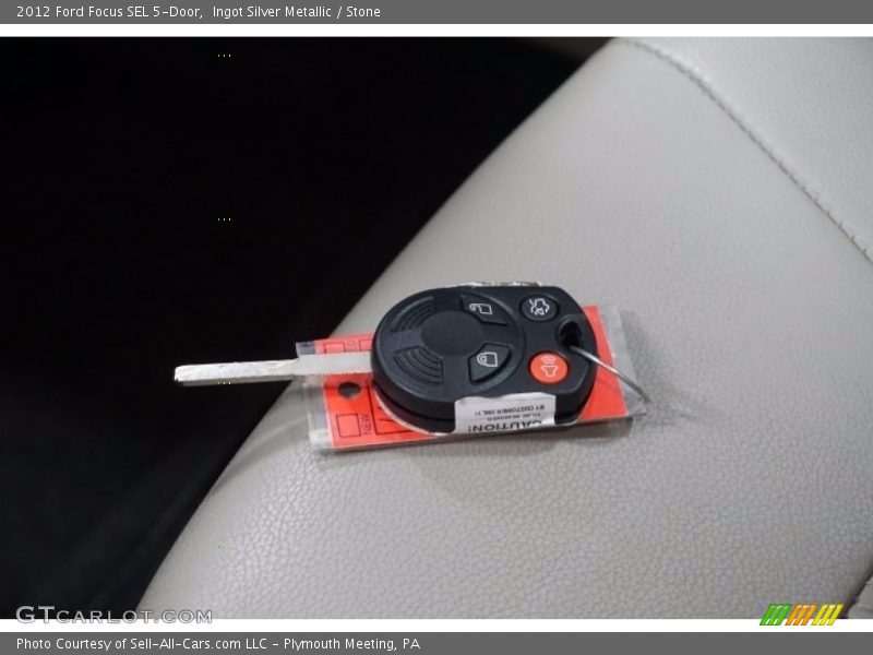 Ingot Silver Metallic / Stone 2012 Ford Focus SEL 5-Door