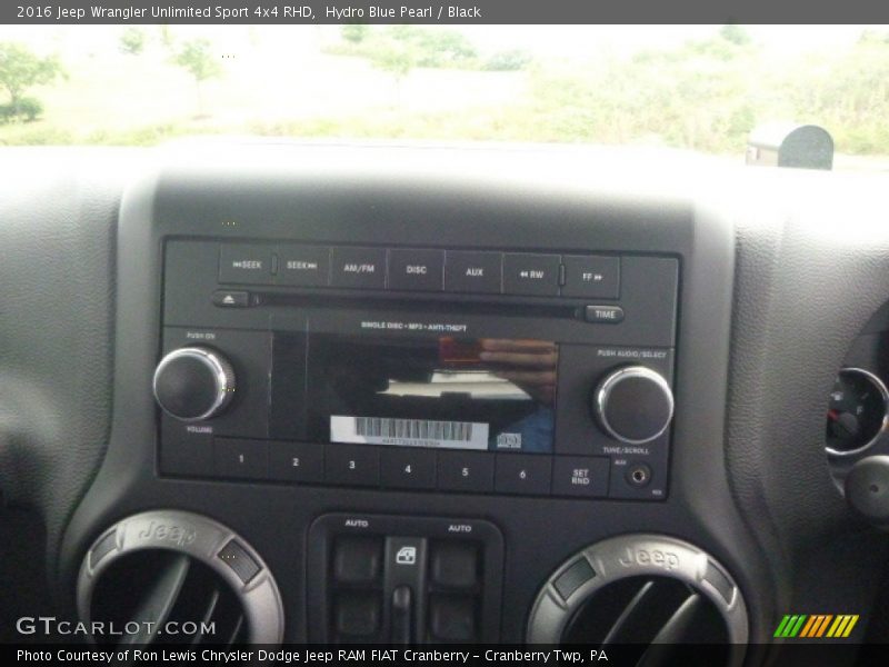 Hydro Blue Pearl / Black 2016 Jeep Wrangler Unlimited Sport 4x4 RHD