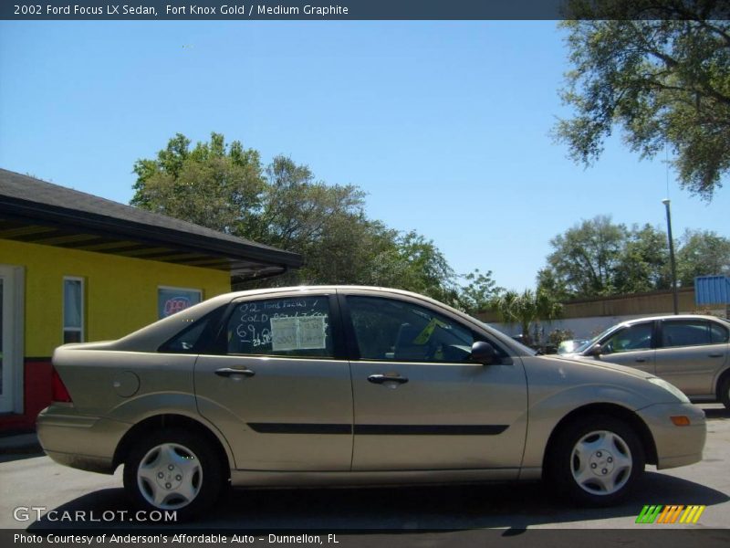 Fort Knox Gold / Medium Graphite 2002 Ford Focus LX Sedan