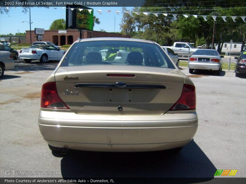 Fort Knox Gold / Medium Graphite 2002 Ford Focus LX Sedan