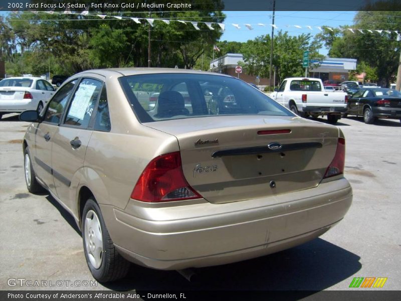 Fort Knox Gold / Medium Graphite 2002 Ford Focus LX Sedan