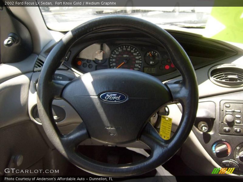 Fort Knox Gold / Medium Graphite 2002 Ford Focus LX Sedan