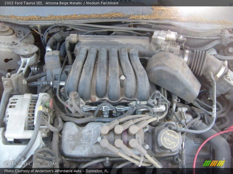 Arizona Beige Metallic / Medium Parchment 2003 Ford Taurus SES