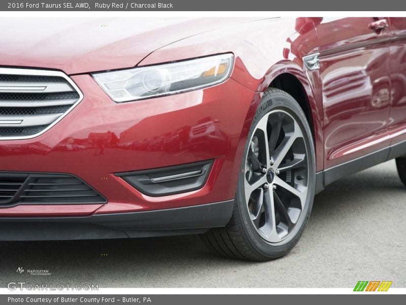 Ruby Red / Charcoal Black 2016 Ford Taurus SEL AWD