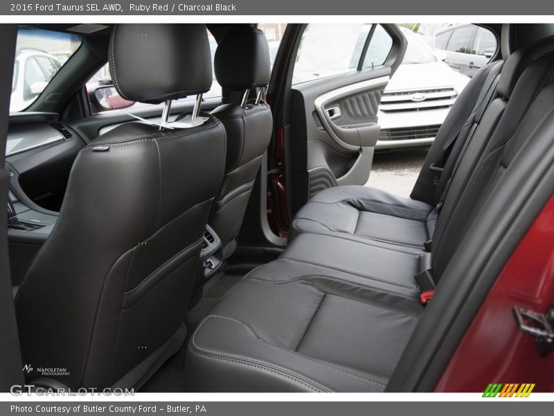 Ruby Red / Charcoal Black 2016 Ford Taurus SEL AWD