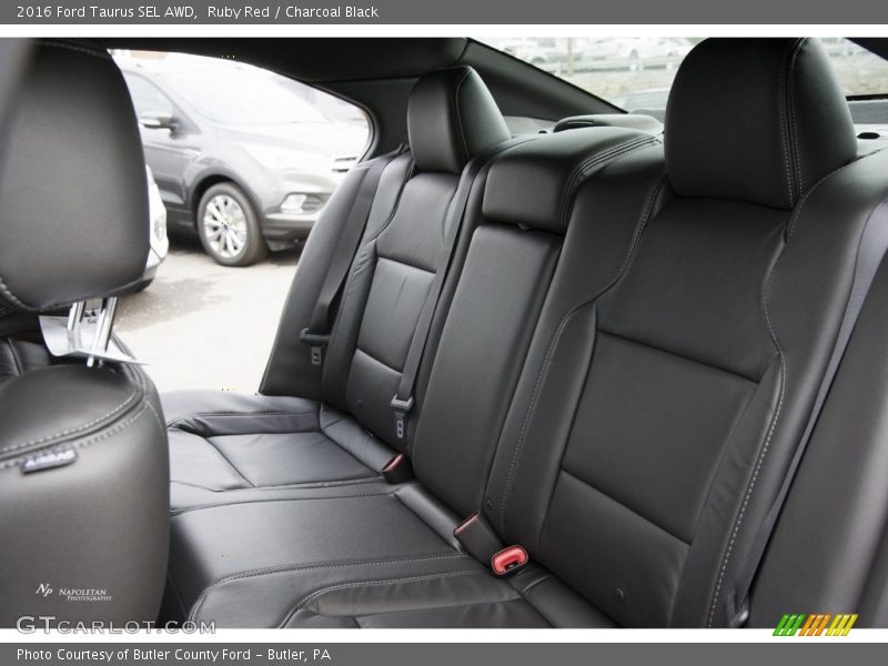 Ruby Red / Charcoal Black 2016 Ford Taurus SEL AWD