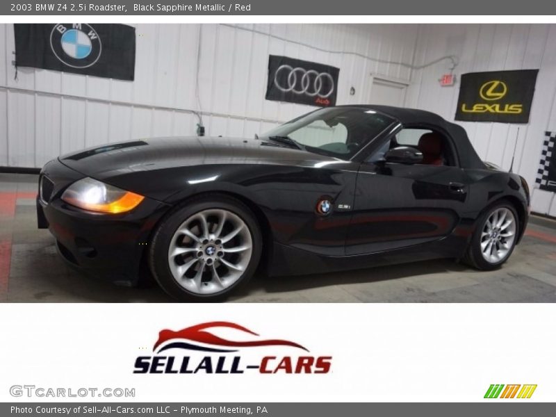 Black Sapphire Metallic / Red 2003 BMW Z4 2.5i Roadster