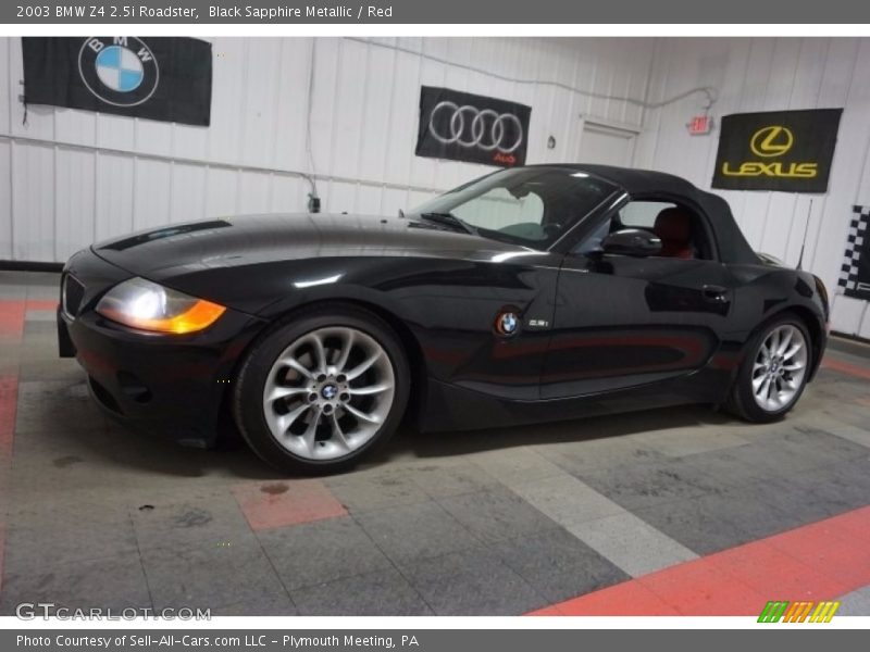 Black Sapphire Metallic / Red 2003 BMW Z4 2.5i Roadster