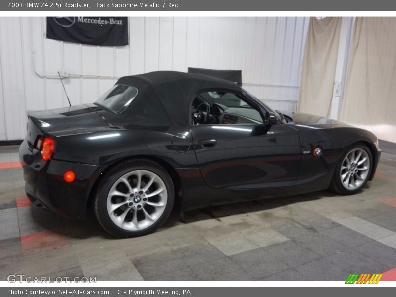 Black Sapphire Metallic / Red 2003 BMW Z4 2.5i Roadster