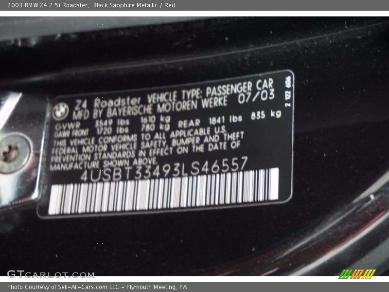 Black Sapphire Metallic / Red 2003 BMW Z4 2.5i Roadster