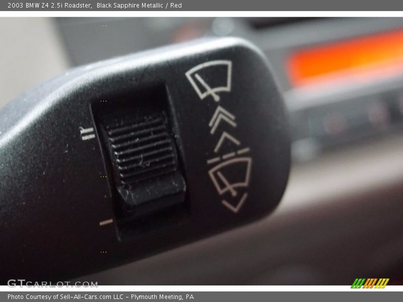 Black Sapphire Metallic / Red 2003 BMW Z4 2.5i Roadster