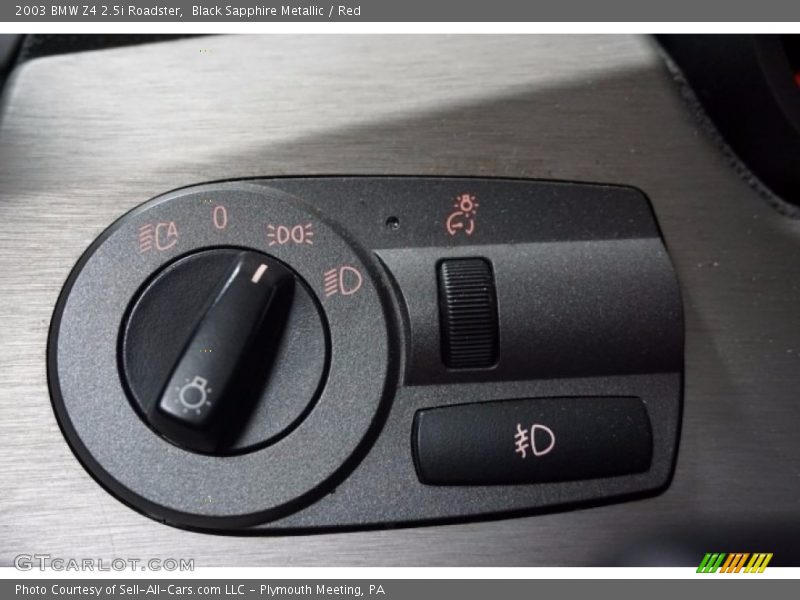 Black Sapphire Metallic / Red 2003 BMW Z4 2.5i Roadster