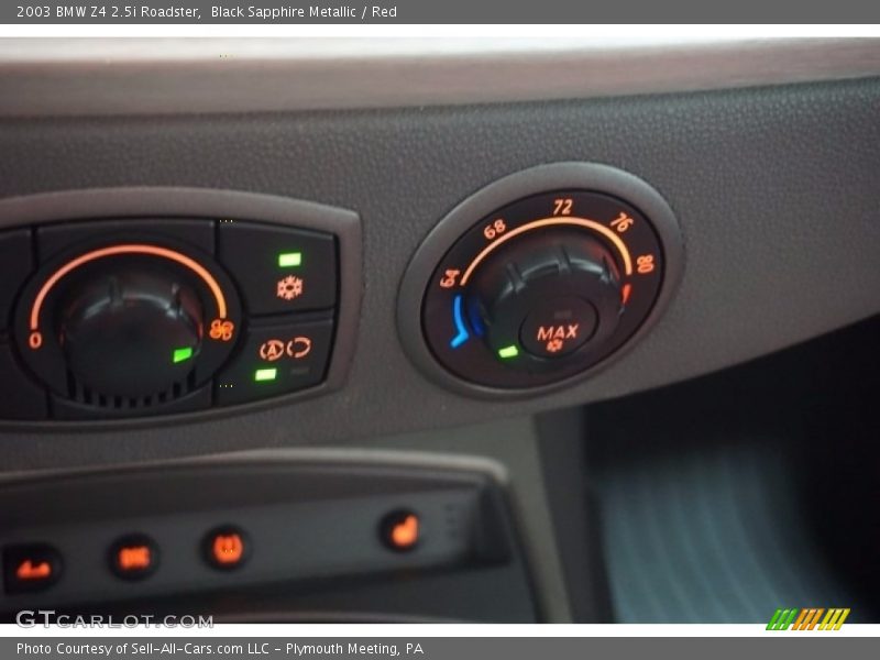 Black Sapphire Metallic / Red 2003 BMW Z4 2.5i Roadster