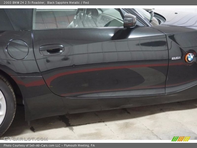 Black Sapphire Metallic / Red 2003 BMW Z4 2.5i Roadster