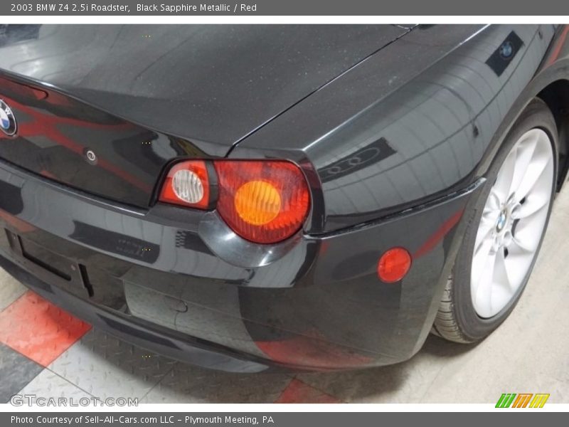 Black Sapphire Metallic / Red 2003 BMW Z4 2.5i Roadster