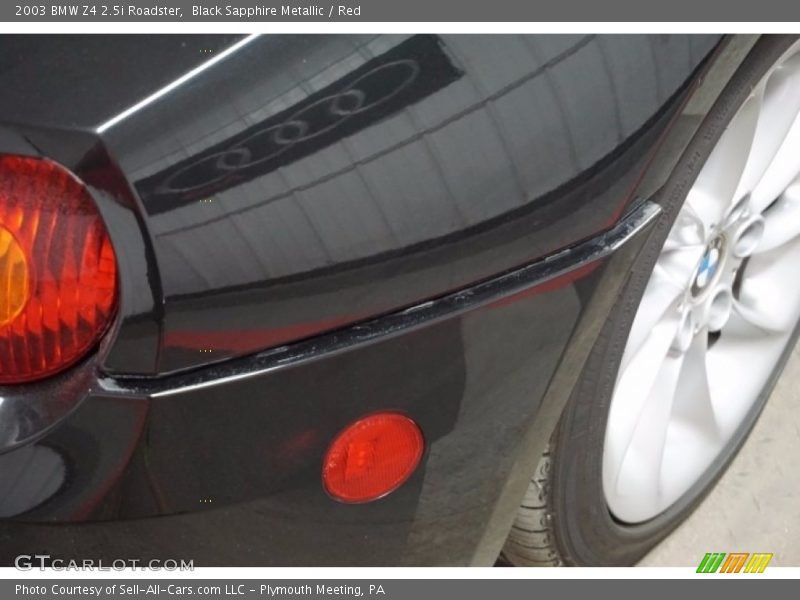 Black Sapphire Metallic / Red 2003 BMW Z4 2.5i Roadster