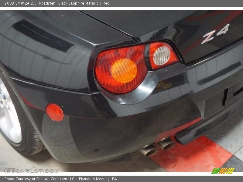 Black Sapphire Metallic / Red 2003 BMW Z4 2.5i Roadster