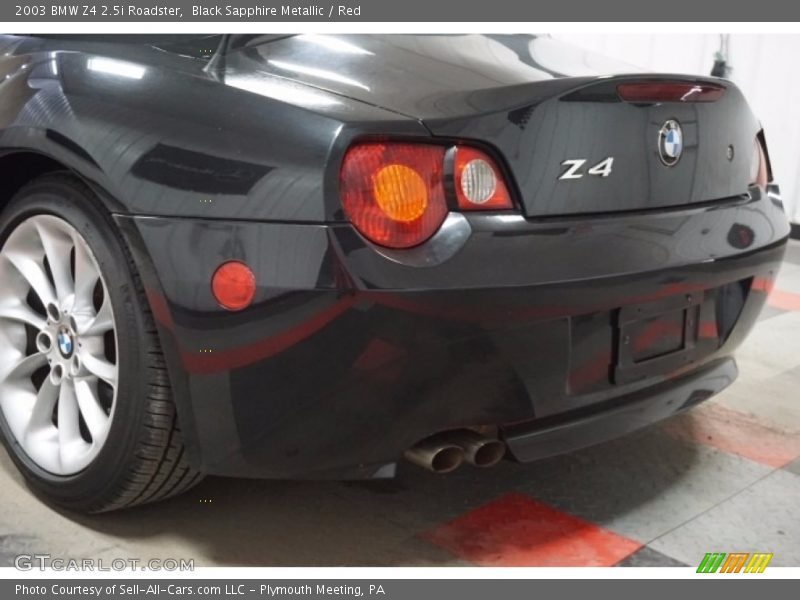 Black Sapphire Metallic / Red 2003 BMW Z4 2.5i Roadster