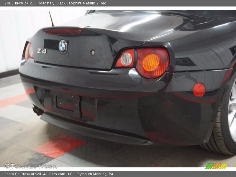 Black Sapphire Metallic / Red 2003 BMW Z4 2.5i Roadster