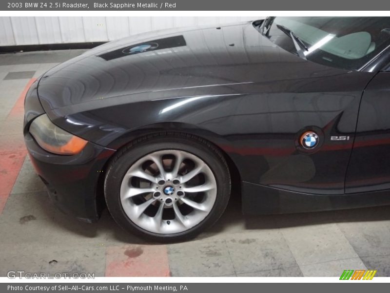 Black Sapphire Metallic / Red 2003 BMW Z4 2.5i Roadster
