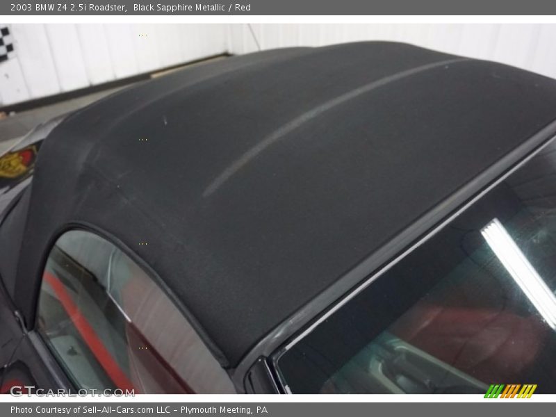Black Sapphire Metallic / Red 2003 BMW Z4 2.5i Roadster