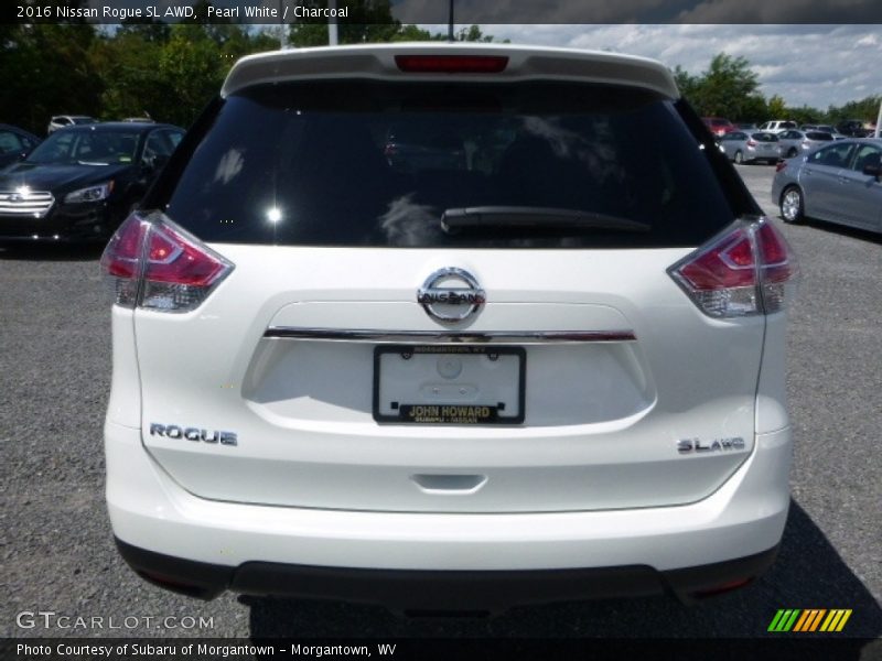 Pearl White / Charcoal 2016 Nissan Rogue SL AWD