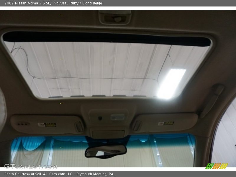 Nouveau Ruby / Blond Beige 2002 Nissan Altima 3.5 SE