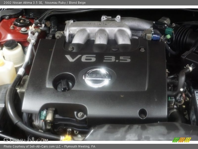 Nouveau Ruby / Blond Beige 2002 Nissan Altima 3.5 SE