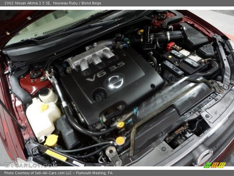 Nouveau Ruby / Blond Beige 2002 Nissan Altima 3.5 SE