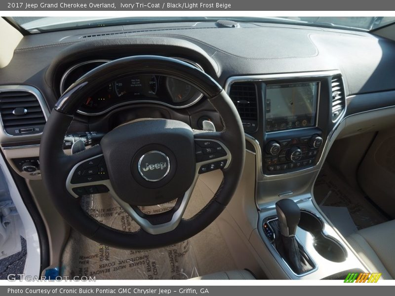 Ivory Tri-Coat / Black/Light Frost Beige 2017 Jeep Grand Cherokee Overland