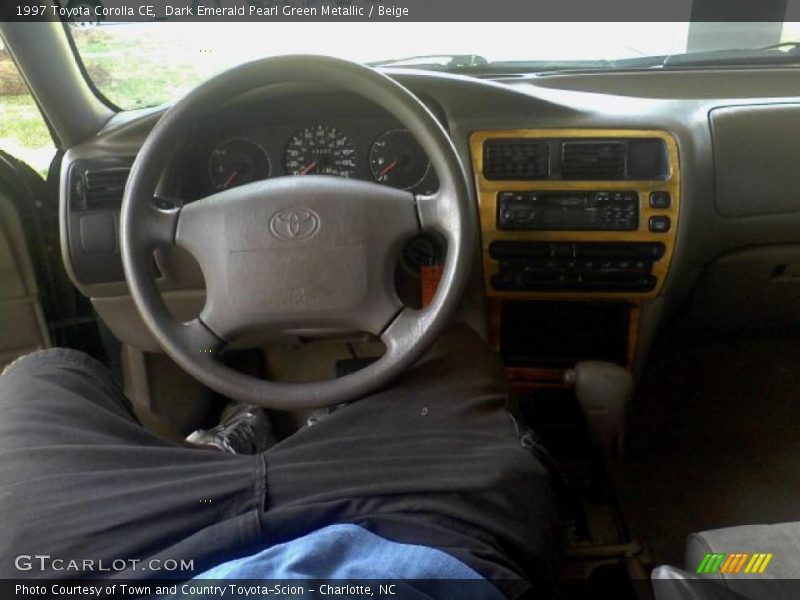 Dark Emerald Pearl Green Metallic / Beige 1997 Toyota Corolla CE