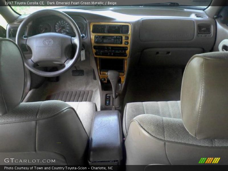 Dark Emerald Pearl Green Metallic / Beige 1997 Toyota Corolla CE