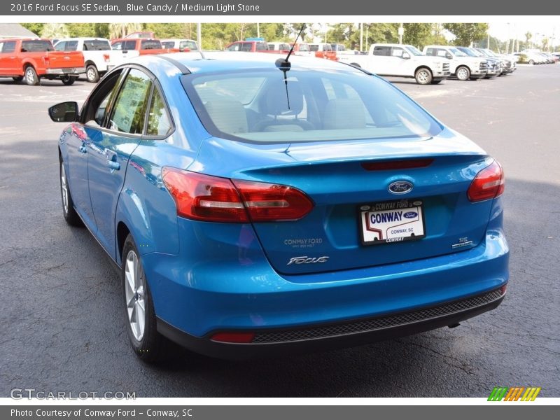 Blue Candy / Medium Light Stone 2016 Ford Focus SE Sedan