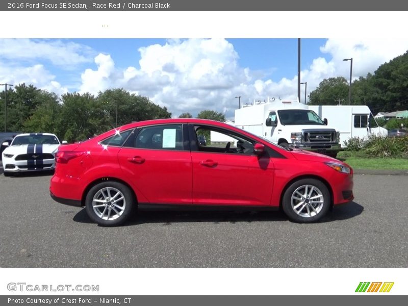Race Red / Charcoal Black 2016 Ford Focus SE Sedan
